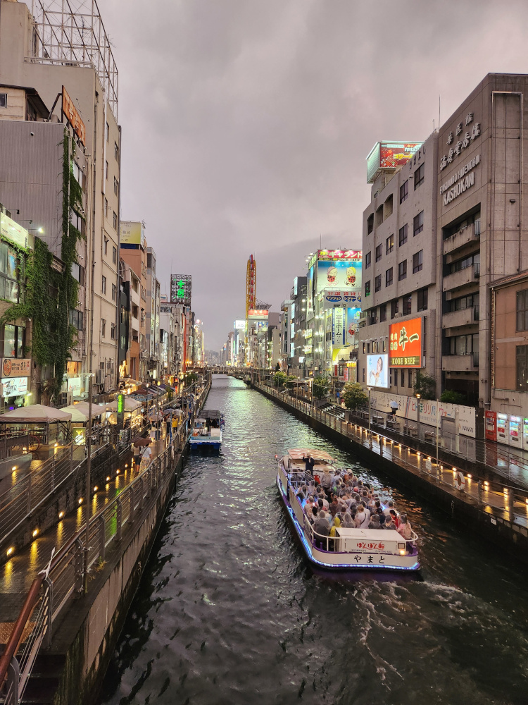 A river with a boat going down it