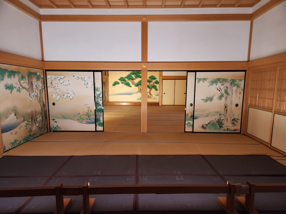 A room with classic Japanese art on the walls